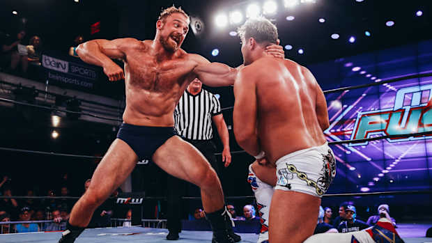 Timothy Thatcher delivers a punch to an opponent